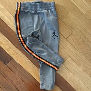 Jordan Kids Gray Joggers with Black and Orange Stripe
